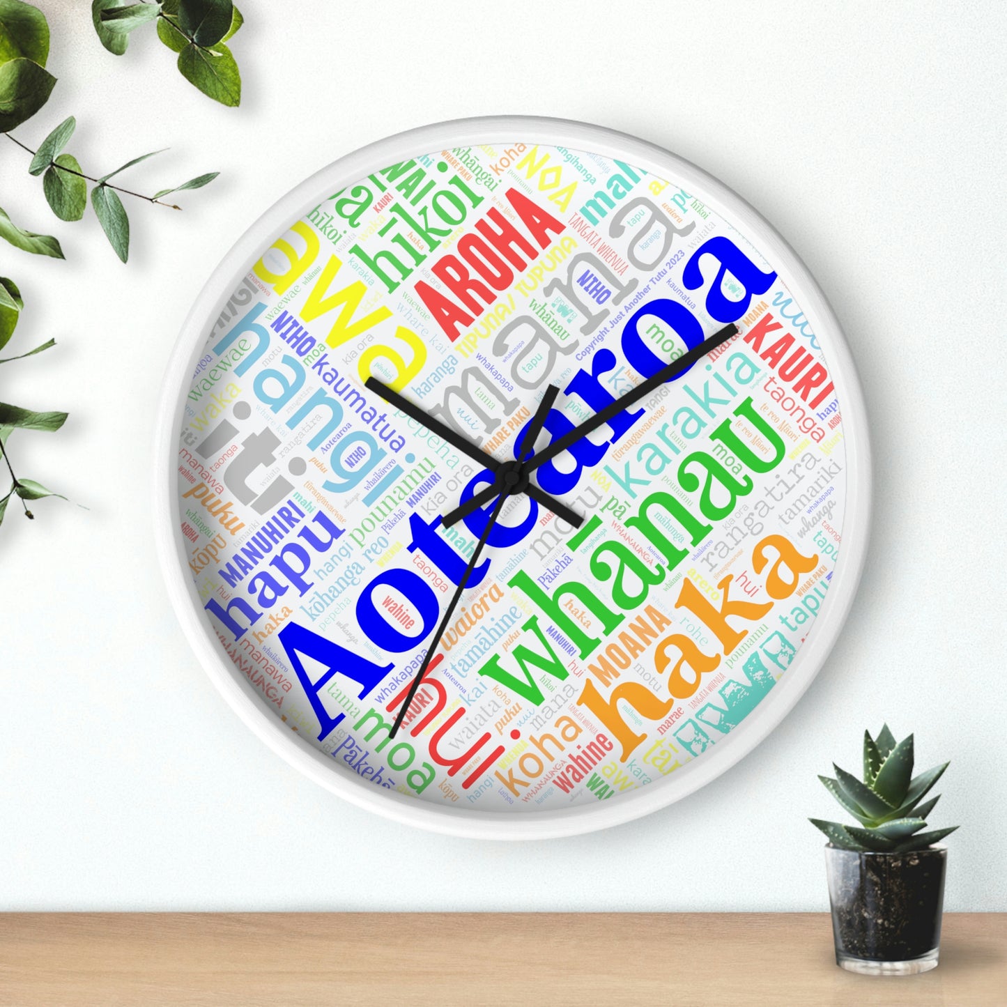 Rainbow Māori Word Art Heart Wall clock